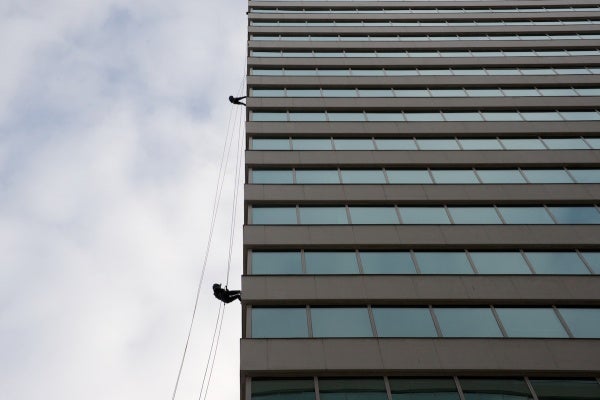 <p><p>Two students at Springside Chestnut Hill Acedemy are decending the 21-story building. (Bas Slabbers/for NewsWorks)</p></p>
