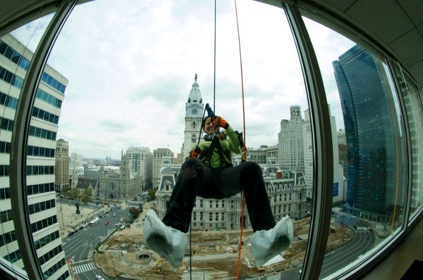 <p><p>Rappellers have to overcome the fear of descending the approximately 230-foot building. (Bas Slabbers/for NewsWorks)</p></p>
