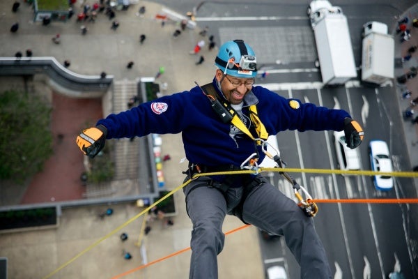 <p><p>Mayor Michael Nutter hangs free more than 230 feet above the ground. (Bas Slabbers/for NewsWorks)</p></p>
