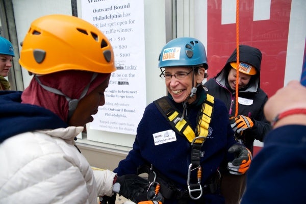 <p><p>Nancy Goldenberg is unlocked from the rope after a safe descent. (Bas Slabbers/for NewsWorks)</p></p>
