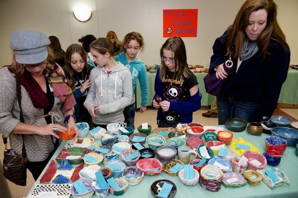 <p><p>Guests pick a handmade bowl from which to dine. (Bas Slabbers/for NewsWorks)</p></p>
