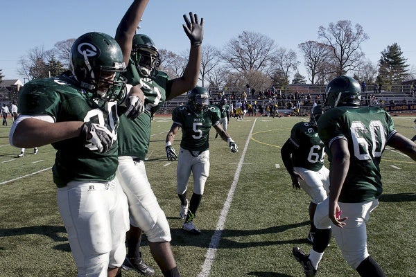 <p><p>Germantown players celebrate as the final seconds tick away. (Bas Slabbers/for NewsWorks)</p></p>
