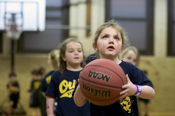 <p><p>The young players shoot hoops to warm up. (Bas Slabbers/for NewsWorks)</p></p>
