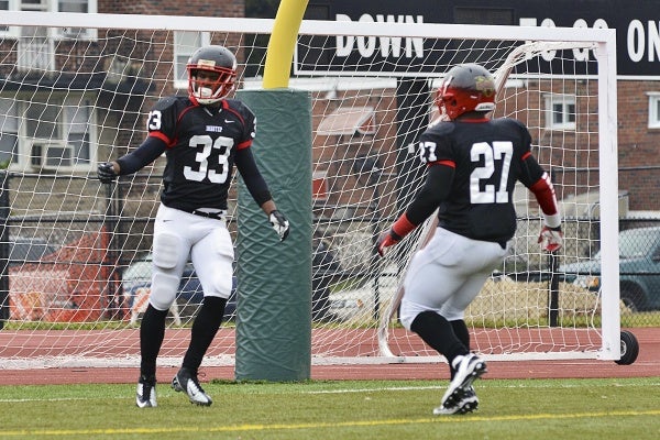 <p><p>Imhotep David Williams and fullback Shahyodd Chavis celebrate Williams' 50-yard touchdown in the second quarter, the extra point for which gave the Panthers their lone lead of the day. (Bas Slabbers/for NewsWorks)</p></p>
