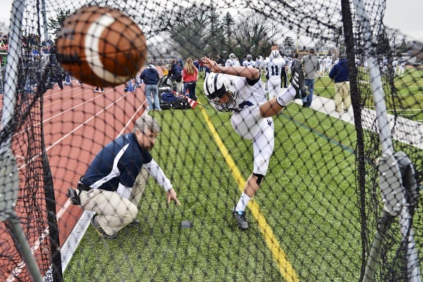 <p><p>Wyomissing kicker Jonah Bowman warms up before the game. (Bas Slabbers/for NewsWorks)</p></p>
