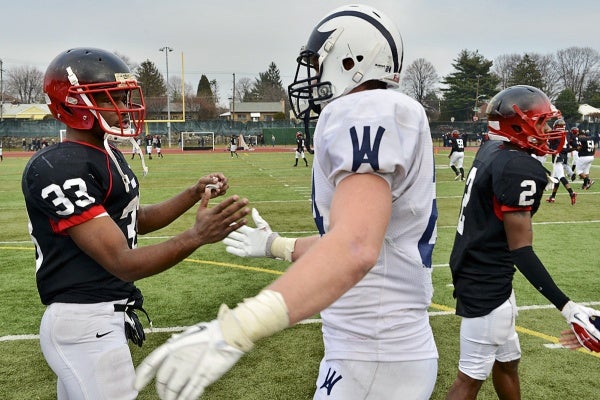 <p><p>Each team had a star running back with bigtime college prospects. Imhotep's David Williams, who has yet to decide between four D-1 offers, shakes hands with Alex Anzalone, who will attend the University of Notre Dame. (Bas Slabbers/for NewsWorks)</p></p>
