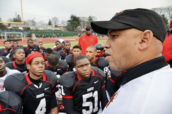<p><p>Coach Albie Crosby tells his Imhotep Panthers that he is proud of them, and lauded their opponents. (Bas Slabbers/for NewsWorks)</p></p>
