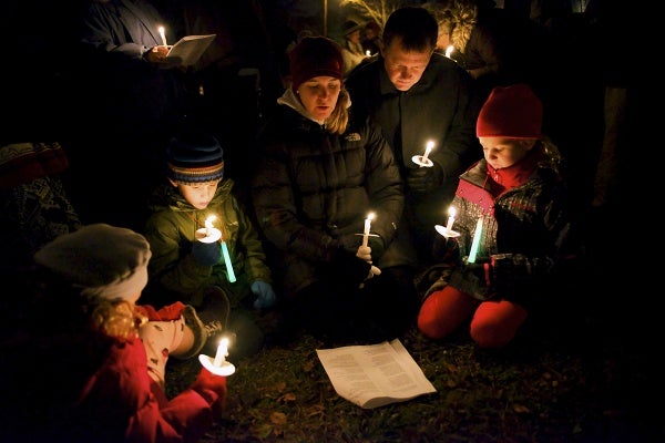 <p><p>A family carols together in East Falls. (Bas Slabbers/for NewsWorks)</p></p>
