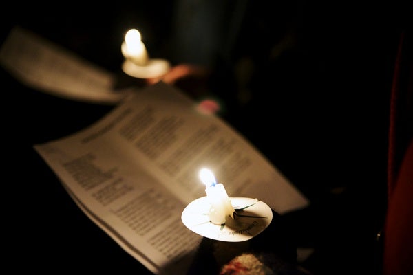 <p><p>Sheet music is lit up by a candle. (Bas Slabbers/for NewsWorks)</p></p>
