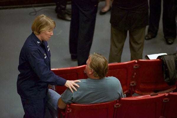 <p><p>U.S. Coast Guard Capt. Kathy Moore talks to resident William Dick, whose employer was closed due to the evacuation order. (Bas Slabbers/for NewsWorks)</p></p>
