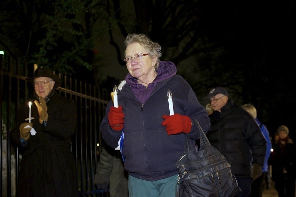 <p><p>Celeste Zappala caries two batterie powers candles. Zappala, a peace activist from Mt. Airy, started to attend vigils after her son got killed in Iraq. (Bas Slabbers/for NewsWorks)</p></p>
