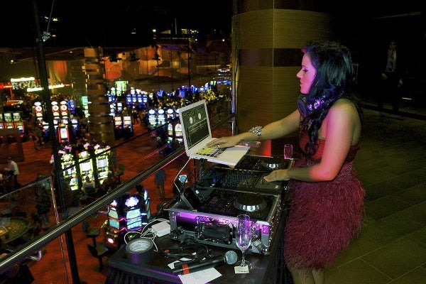 <p><p>Standing on the balcony this DJ provides music for the gambling floor. (Bas Slabbers/for NewsWorks)</p></p>
