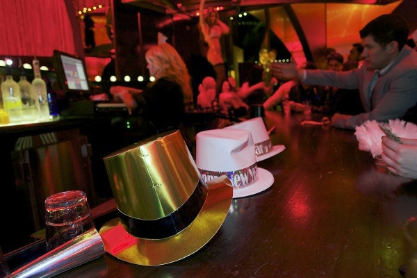 <p><p>New Year hats lay on the bar of the Burlesque area. (Bas Slabbers/for NewsWorks)</p></p>
