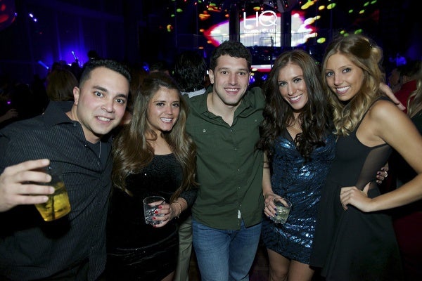 <p>A group of friends smiles at the camera at the HQ Nighclub as the early hours of 2013 tick away. (Bas Slabbers/for NewsWorks)</p>

