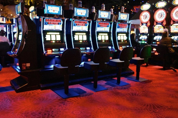 <p>A row of slot machines on the casino floor of Revel Resorts and Casino. (Bas Slabbers/for NewsWorks, file)</p>

