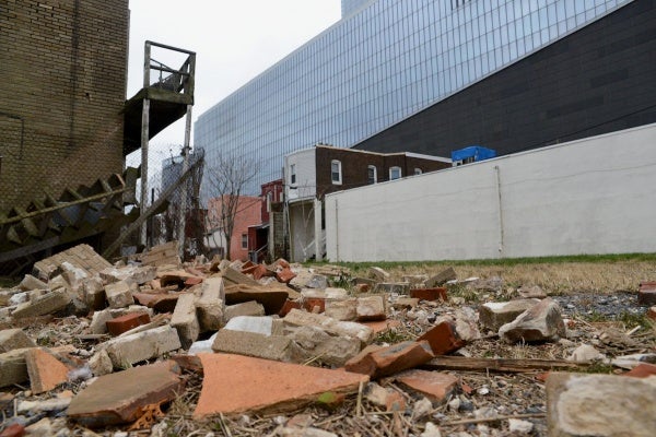 <p>4:45pm - A chimney came down at an onoccupied dweling next to the Revell Casino. (Bas Slabbers/for NewsWorks)</p>
