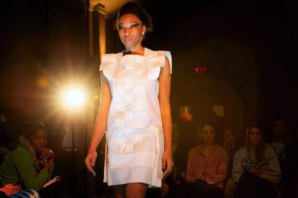 <p><p>Akeema models a panel white dress made by a Phila U. design student. (Bas Slabbers/for NewsWorks)</p></p>
