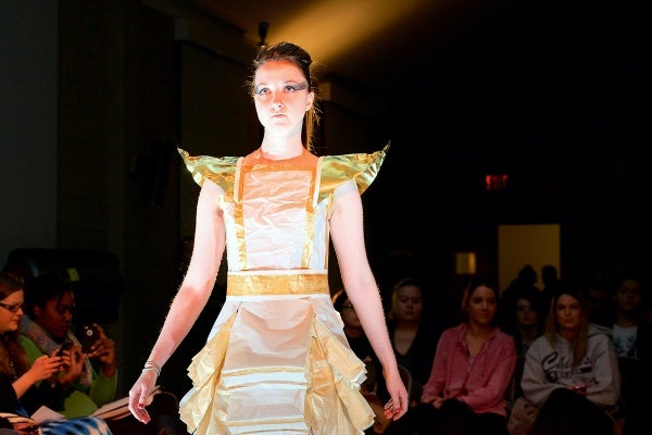 <p><p>Shannon Mckernan designed this white and gold paper bag dress. (Bas Slabbers/for NewsWorks)</p></p>
