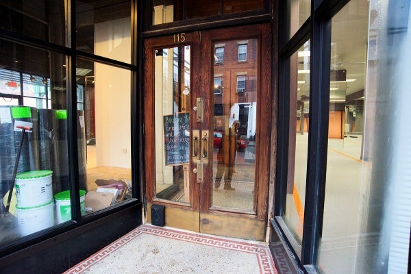 <p><p>The former front door of the building is now the entrance to the yoga studio. The other business can be reached from the Cresson Street side. (Bas Slabbers/for NewsWorks)</p></p>
