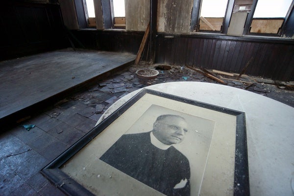 <p><p>A portrait of Rev. Edward H. Vogt, rector from 1931 to 1954, was left behind. (Bas Slabbers/for NewsWorks)</p></p>
