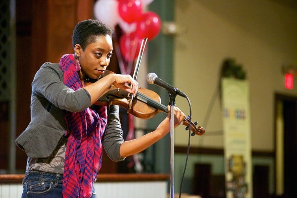 <p><p>Somer Jordan sang and played a violin piece. (Bas Slabbers/for NewsWorks)</p></p>
