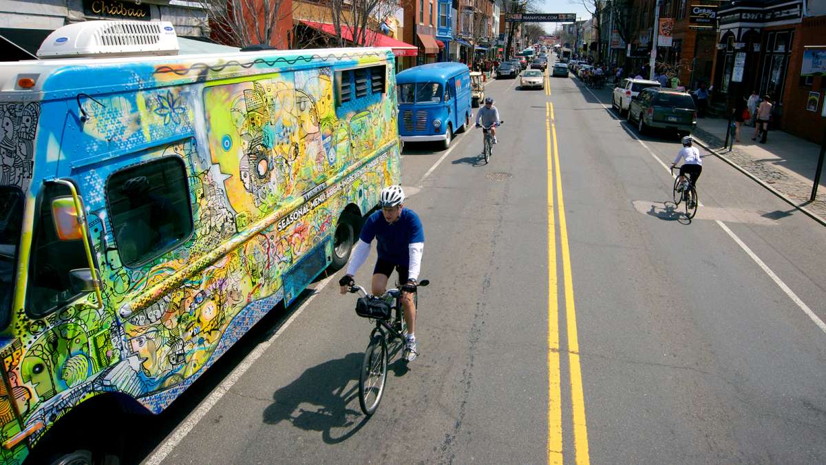 Food trucks line both sides of Manayunk's Main Street (Bastiaan Slabbers for WHYY)