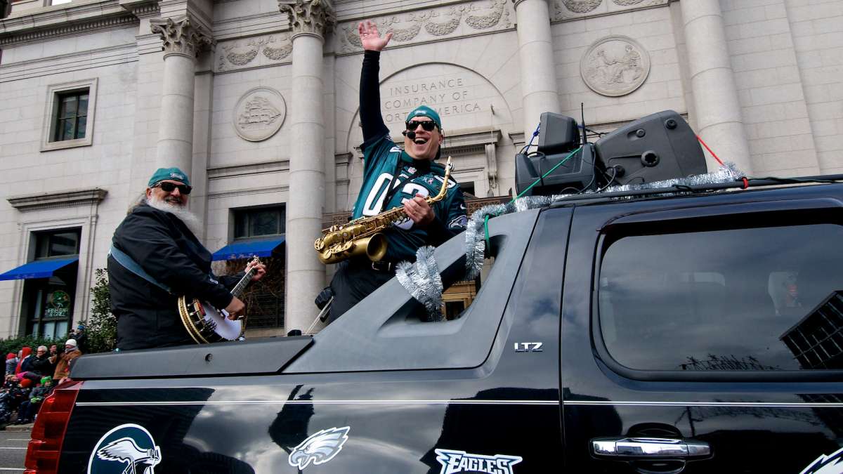 A band in Eagles gear performed from the back of a pick-up. (Bas Slabbers/for NewsWorks)