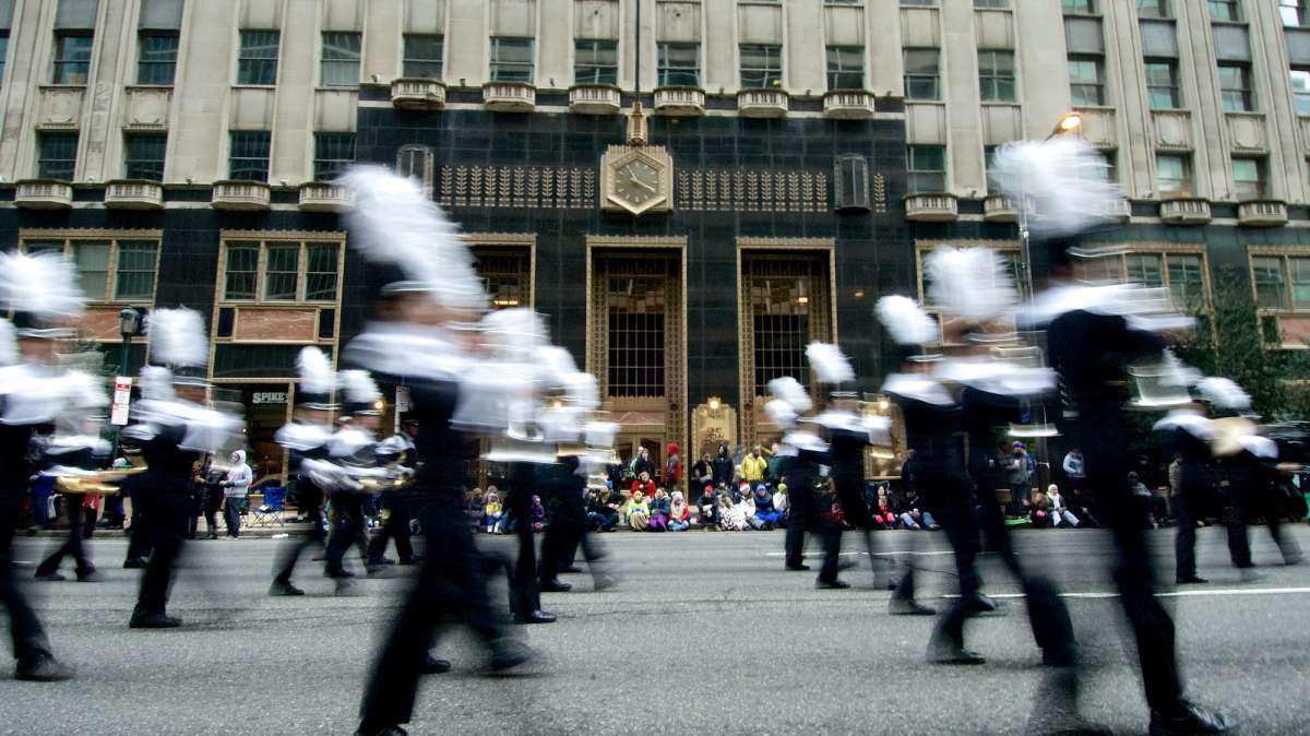 One of the marching bands is seen passing Suburban Station on Market Street. (Bas Slabbers/for NewsWorks)