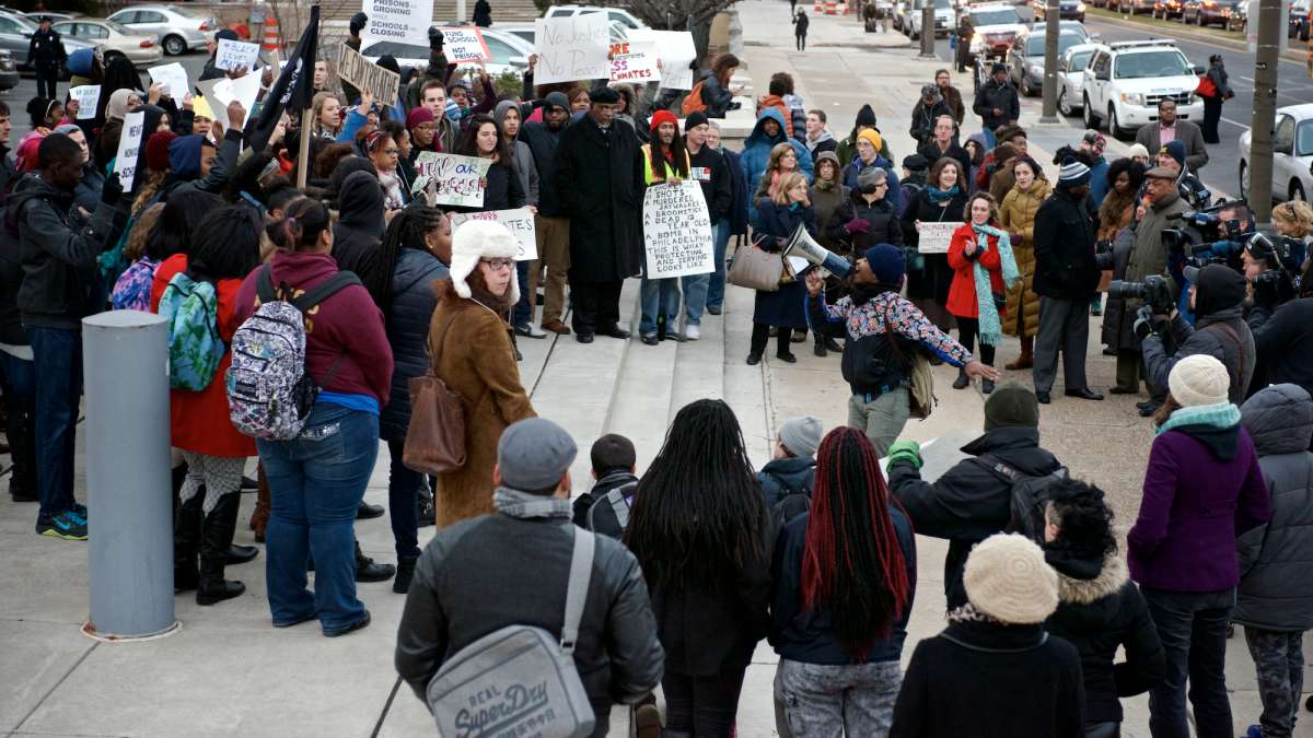 Before the  SRC meeting Thursday night, protesters gathered on the steps of the districts administration building for a 'Die-in'. (Bas Slabbers/for NewsWorks)