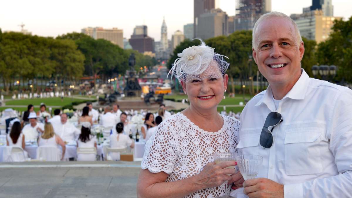 Goldie Brown and Mark Beyerle, of Center City, pose for a photo atop the art museum Steps.
