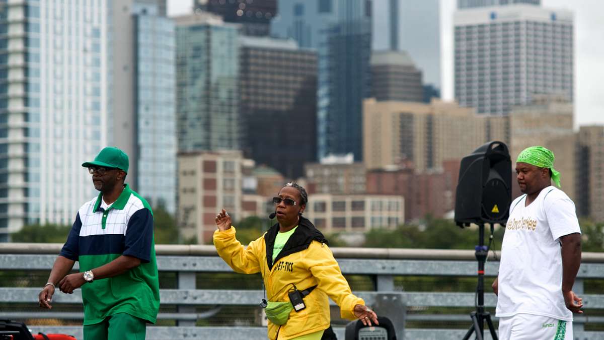The Center City skyline forms the backdrop for Line Dancing with a View, hosted by JO-ET-TICS Dance on South Street Bridge during during the Philly Free Streets day.