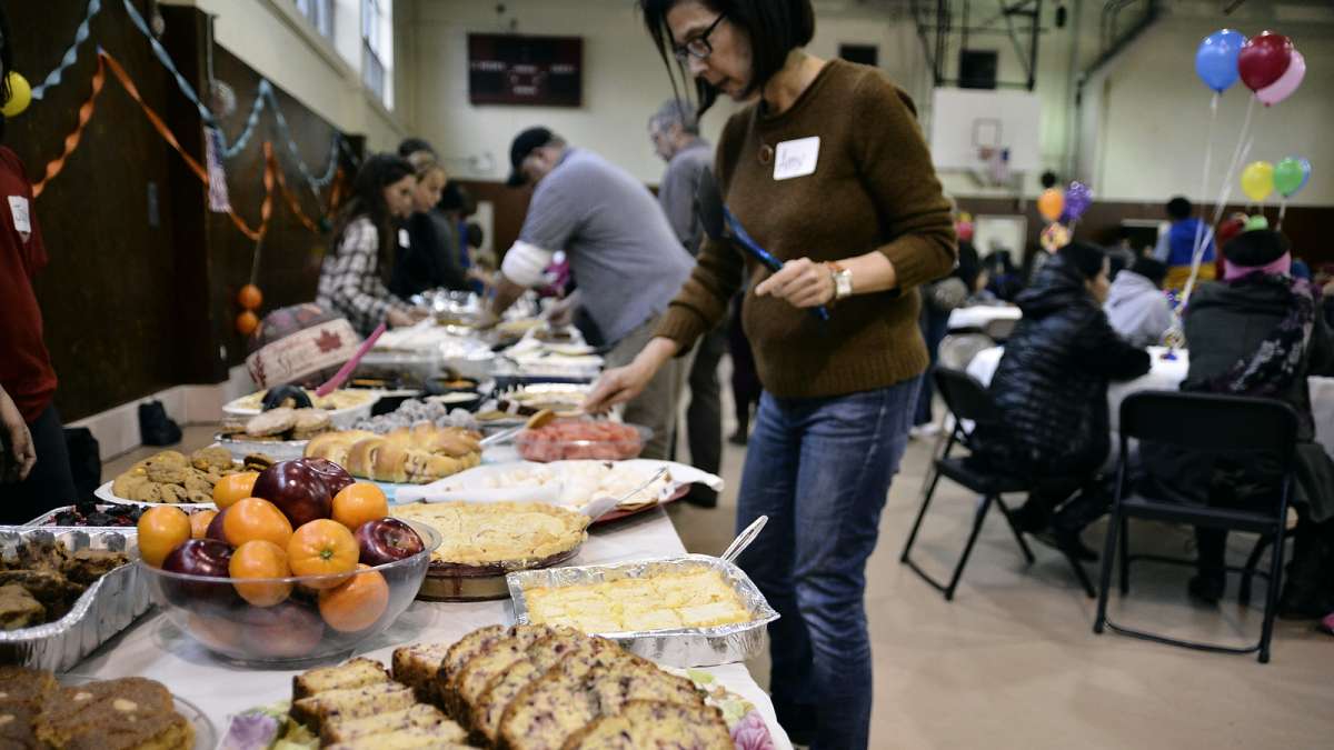 Traditional and non-traditional Thanksgiving dinner offerings are spread out buffet-style. (Bastiaan Slabbers for NewsWorks)