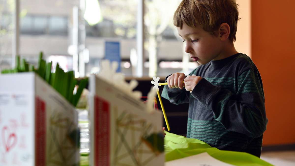 August Clayton, 5, builds a geodesic dome, a shape popularized by innovator Richard Buckminster Fuller.