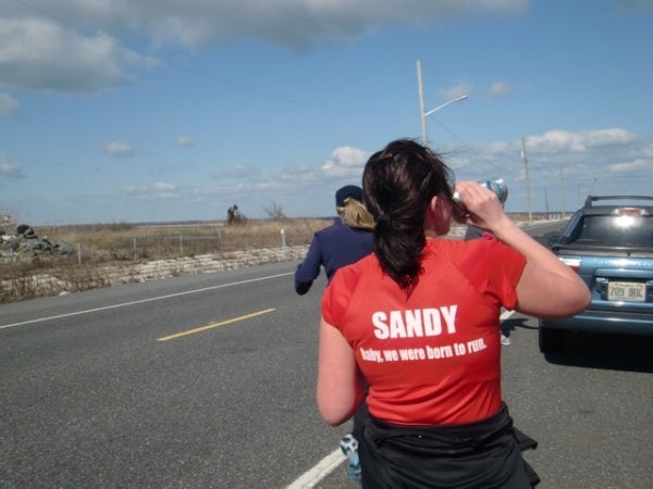 Olivia Tattory runs from Avalon into Sea Isle (Jen A. Miller/for NewsWorks)