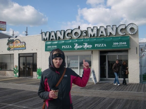 Alison Stuart shows her disapproval over the name change of Mack & Mancos into Manco & Mancos. (Photo courtesy of Liz Pagonis)