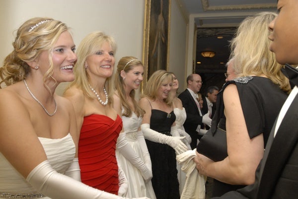 <p><p>Debutante Lacey Deaver Swift-Farley (left), her mother Nina E. Swift, debutantes Courtney Jennifer and Laura Katerina McCauley and their mother Colleen Holt-McCauley and Peter F. Cooke, greet guests in the receiving line. (Photo courtesy of Sabina Louise Pierce)</p></p>
