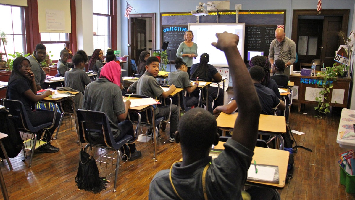  Students attend class at Belmont Charter School in West Philadelphia. A new analysis shows the cost to Philadelphia school district of losing students to charter schools is nearly $2,000 less per capita than previously reported. (Emma Lee/WHYY, file) 
