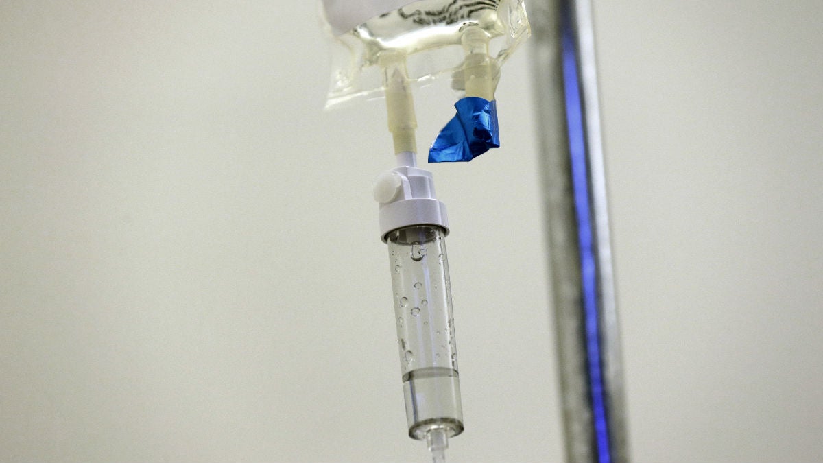  Chemotherapy drugs are administered to a patient. (AP Photo/Gerry Broome) 