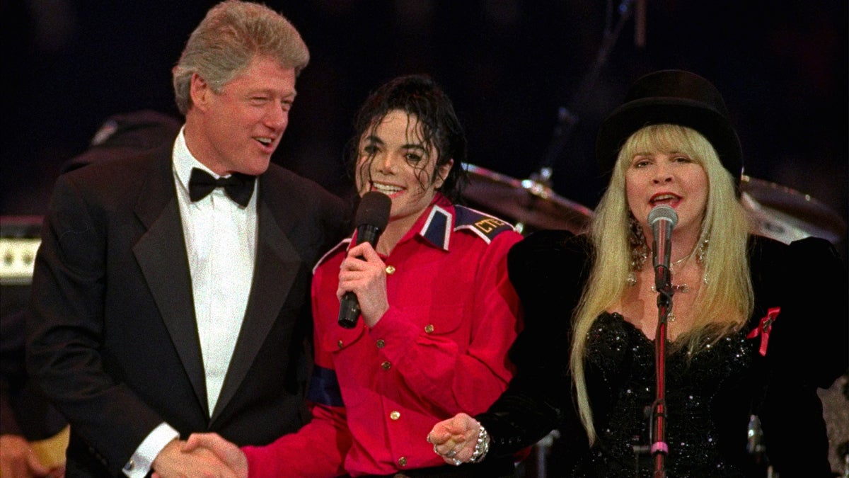  President-elect Clinton joins Michael Jackson and Stevie Nicks, of Fleetwood Mac, as they sing 