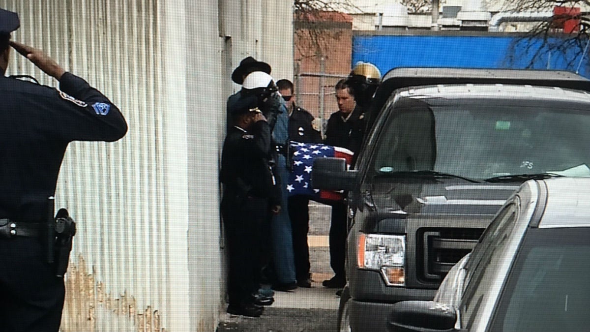  Sgt. Steven Floyd's body arrives at the Medical Examiner's office in Wilmington. (John Jankowski/for Newsworks) 
