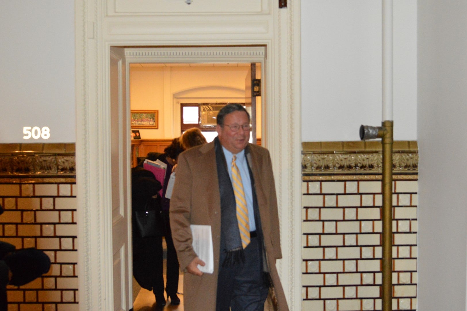  Comcast's David Cohen emerges from Councilman Bill Greenlee's office after a meeting (Tom MacDonald, WHYY) 