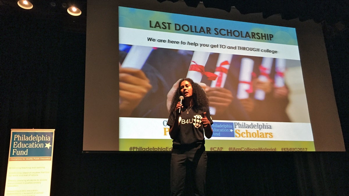  Dolores Adriaanse with the Philadelphia Education Fund prepares to present first-generation college students with scholarships at the Know Before You Go event. (Avi Wolfman-Arent/WHYY) 