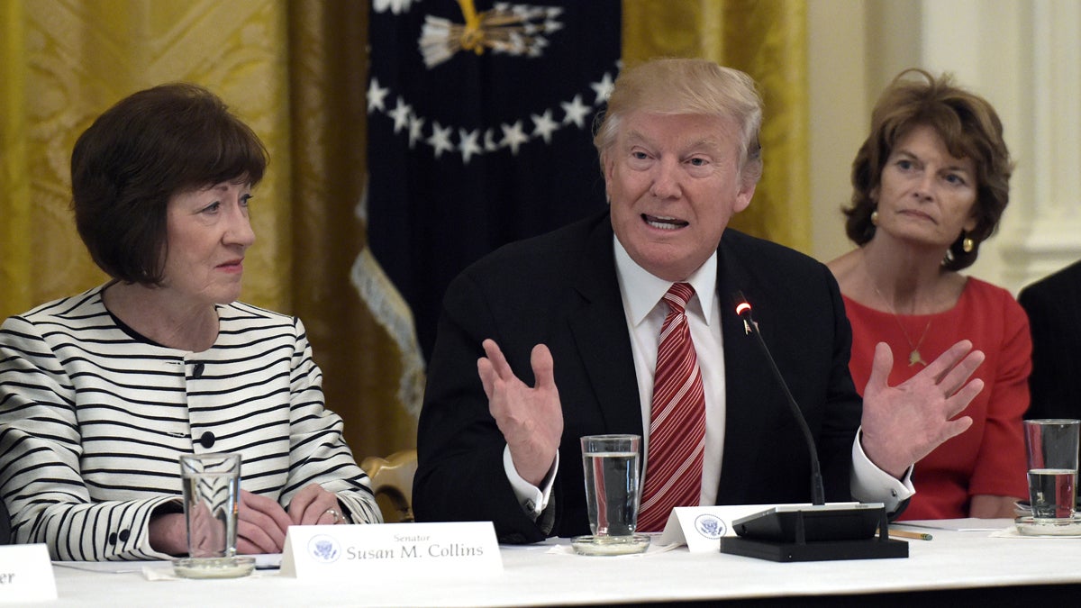  President Donald Trump, center, meets with Republican senators on health care in the East Room of the White House in Washington, Tuesday, June 27, 2017. Sen. Susan Collins, R-Maine, left, and Sen. Lisa Murkowski, R-Alaska, right, both voted against repealing the Affordable Care Act on Thursday night. (AP Photo/Susan Walsh) 