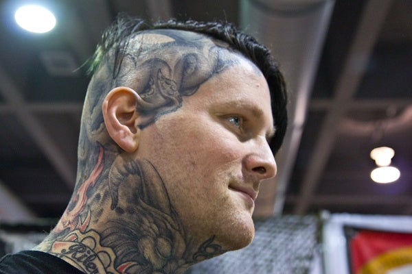 Jim Weiss from Port Richmond in Phila., is almost completely covered in tattoos.  (Kimberly Paynter/WHYY)