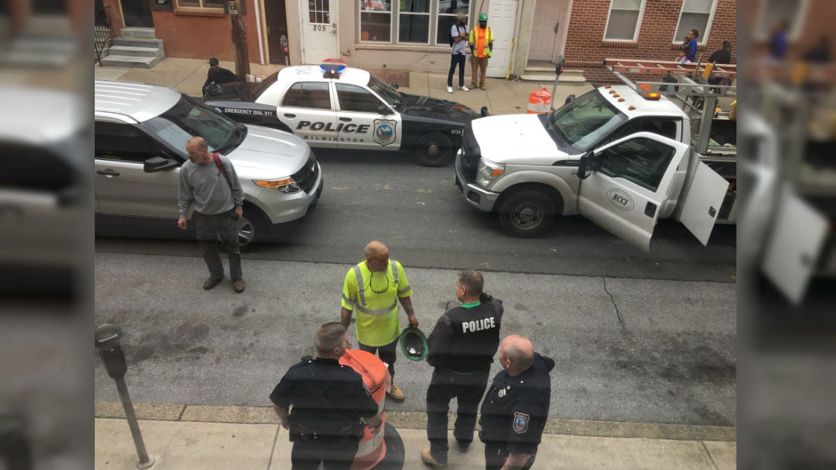  Police investigate a shooting on 7th St. Wednesday afternoon.  A 13-year-old boy was arrested after a brief chase. (Mark Eichmann/WHYY) 