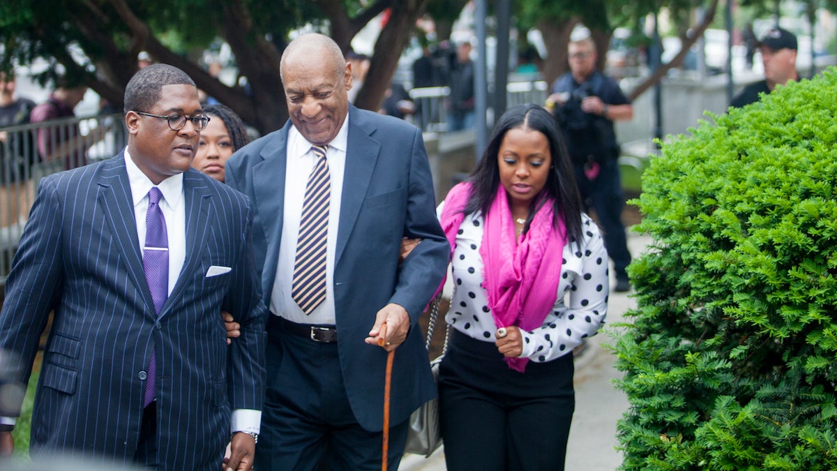  Comedian Bill Cosby makes his way into the Montgomery County Courthouse Monday for the first of day of his trial for the alleged sexual assault of Andrea Constand. (Brad Larrison for NewsWorks) 