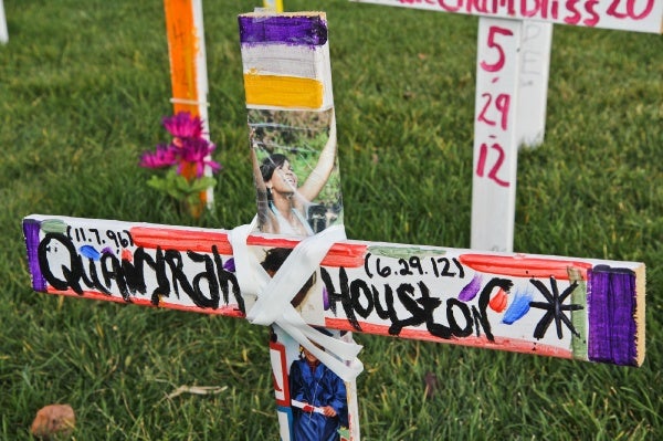 <p>Crosses on the Camden City Hall front lawn represent victims of homicide in the year 2012. Many are personalized to memorialize the slain. (Kimberly Paynter/for NewsWorks)</p>
