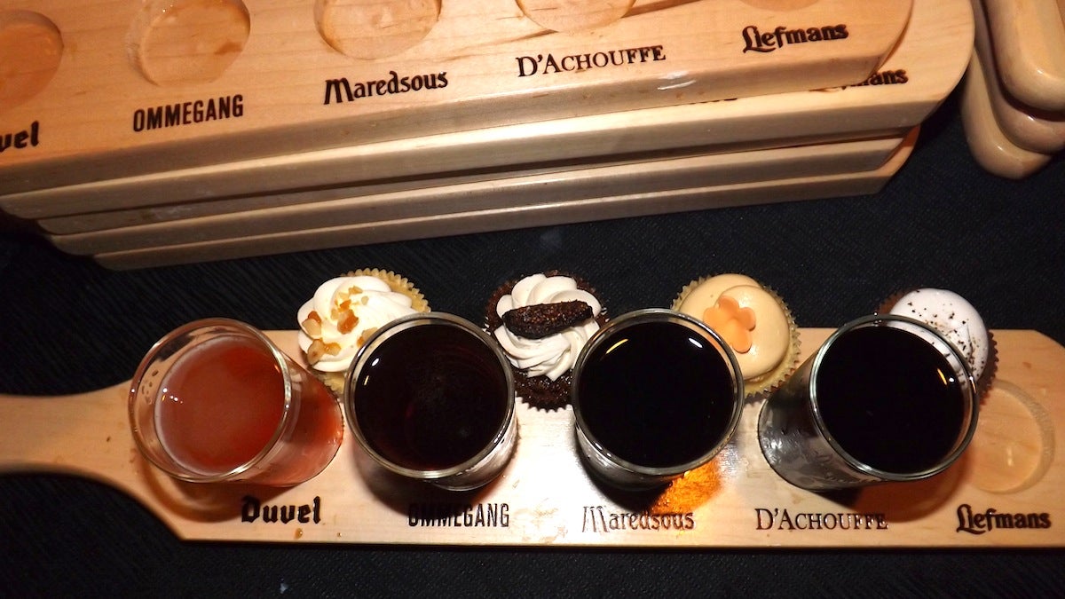  Each tasting flight included four mini beers from Southern Tier Brewing Co. and four mini cupcakes from Sweet Elizabeth's Cakes. (Meg Frankowski/for NewsWorks) 