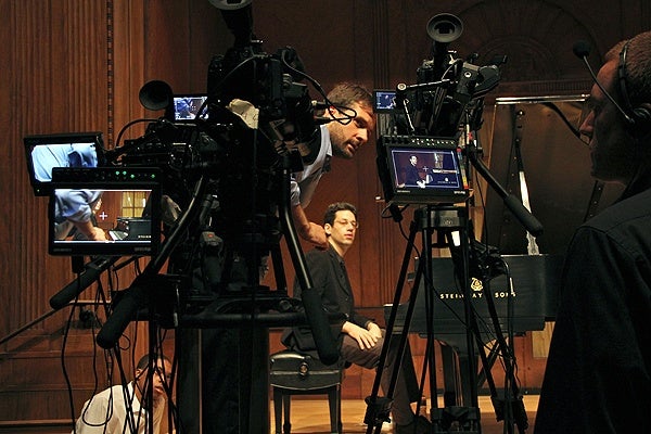 Director/producer Greg Sharrow fine tunes the placement of the three cameras he is using to make the Curtis Institute's first free online course, Exploring Beethoven's Sonatas with Jonathan Biss. (Emma Lee/for NewsWorks)