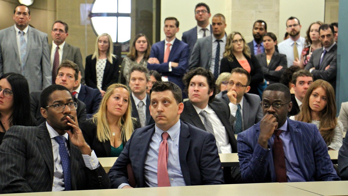  Employees of the Philadelphia district attorney's Office gather to hear first Assistant District Attorney Kathleen Martin talk about plans for the future. (Emma Lee/WHYY) 